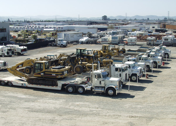 Pick-up and delivery of construction equipment